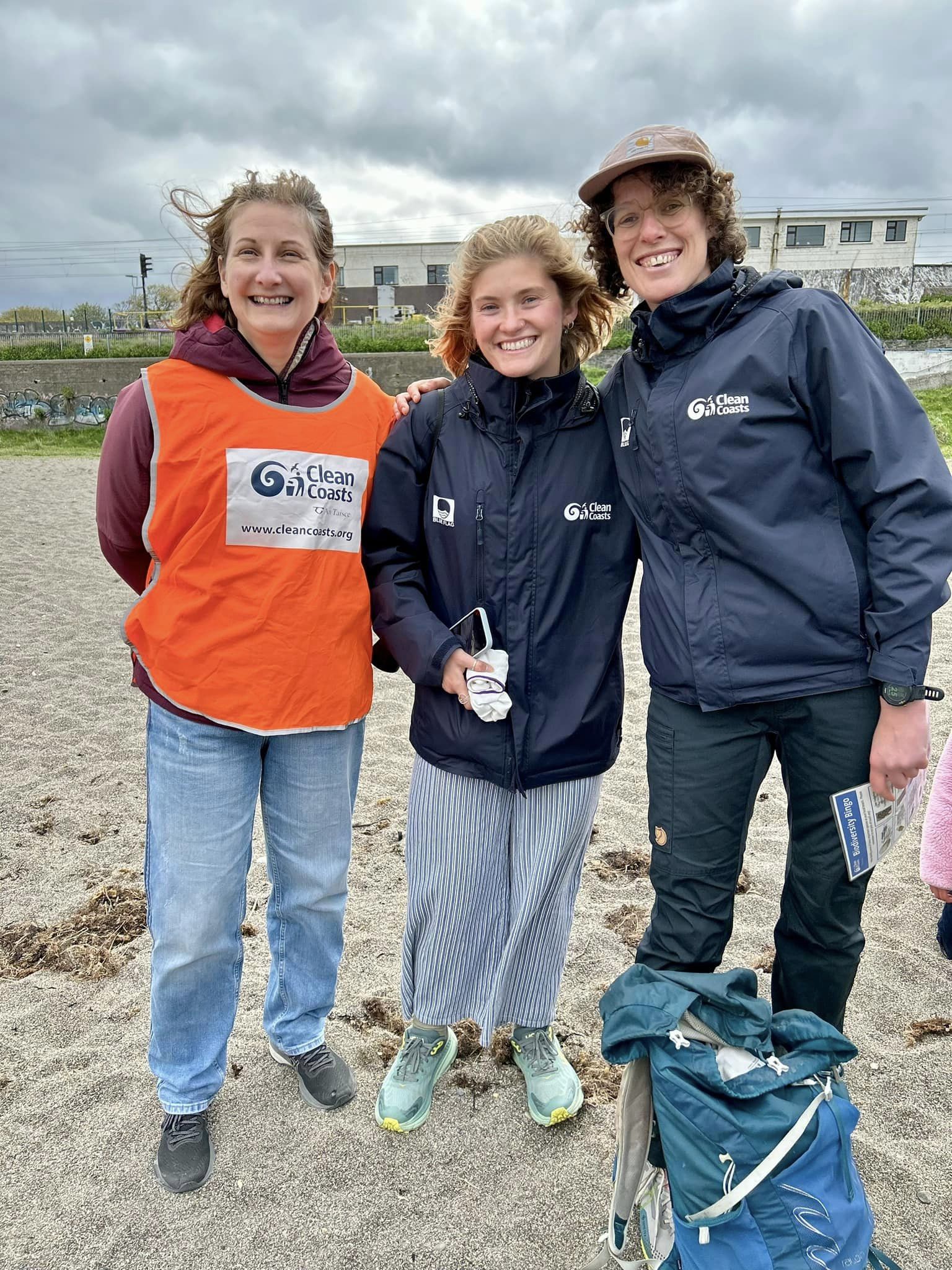 Image shows members of the Clean Coasts team on Greystones South Beach, everyone is smiling after a fun Biodiversity Bingo.